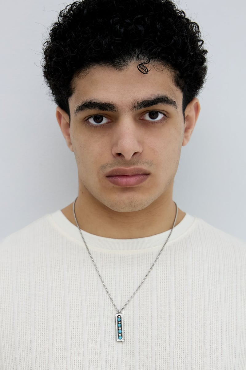 Mannen ketting met balletjes bedel